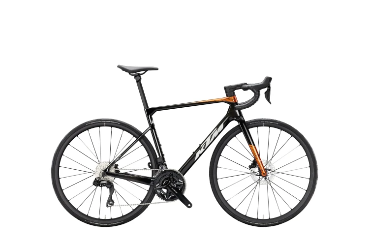 1250453115_revelator_alto_elite_di2_m_55__carbon-burnt_orange__opal_white.webp